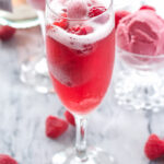 Raspberry Sorbet Bellinis | 3 ingredients is all you need to make these pretty and delicious cocktails!
