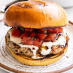 Turkey Bruschetta Burger on a white plate.