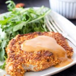Sriracha Almond Crusted Pork Chops with Spicy Honey Mustard Sauce | Spicy almond crusted pork chops with an amazing sweet and spicy sriracha honey mustard sauce!