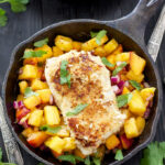 Coconut Almond Crusted Cod with Pineapple Peach Salsa | This paleo and gluten-free coconut almond crusted cod is perfect served with fresh pineapple peach salsa!