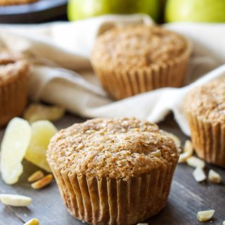 Pear Ginger Muffins | Whole grain muffins filled with pears, almonds, and little bits of candied ginger!