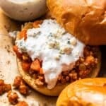 Buffalo chicken sloppy joe topped with blue cheese dressing.