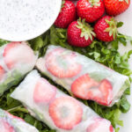 Grilled Chicken and Strawberry Spring Rolls | These fresh and crunchy spring rolls are full of summer flavor! Dip them in a healthy poppy seed dressing for a fun and easy appetizer!