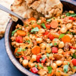 Every bite of this Moroccan Turkey and Chickpea Skillet is filled with savory and sweet flavors. Warm spices such as cinnamon and cumin tie everything together in this easy, gluten-free dinner!