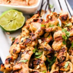 Grilled Chicken Satay with Almond Butter Sauce is a recipe you'll be making over and over again! Marinated in coconut milk and flavorful spices, grilled and served with a mouthwatering sweet and spicy almond butter sauce for dipping.
