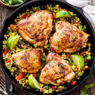 Skillet Chili Lime Chicken Thighs with Confetti Cauliflower Rice is an easy and flavorful one skillet dinner the whole family will love! Gluten-free, low in carbs and high in protein!
