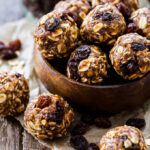 These gluten-free and vegan Oatmeal Raisin Cookie Energy Bites have all the flavor that the cookies do, but are made with wholesome ingredients. They're perfect for post workout refueling or a healthy dessert!