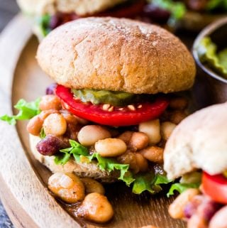 These protein packed Vegan Three Bean Sloppy Joe Sliders are perfect for an easy weeknight dinner or they make great game day food! Simmered in a mouthwatering sweet and tangy sauce and on the table in under 30 minutes!