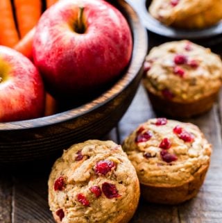 Whole wheat and vegan friendly muffins loaded with apples, carrots, cranberries and pecans are the perfect way to start the morning! These Cranberry Apple Carrot Muffins are hearty, moist and won't leave you hungry or with a sugar buzz.