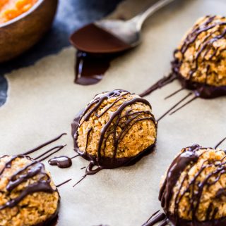 Coconut macaroons made healthier and with a fall twist! You'll love these easy to make Chocolate Dipped Pumpkin Macaroons! {Gluten-free, Vegan and Paleo}