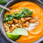 Thai Sweet Potato Carrot Soup is creamy, sweet, a little spicy and full of flavor! A healthy and filling soup that is sure to warm you up on a cold day. {Vegan, Gluten-free and Paleo}