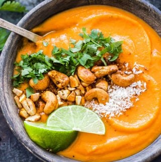 Thai Sweet Potato Carrot Soup is creamy, sweet, a little spicy and full of flavor! A healthy and filling soup that is sure to warm you up on a cold day. {Vegan, Gluten-free and Paleo}