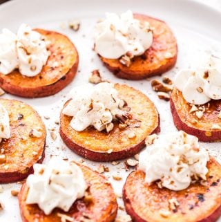 Not interested in making a pie for your holiday dessert? No problem! These Brûléed Sweet Potato Bites with Bourbon Maple Whipped Cream are the perfect solution! #sweetpotato #dessert #whippedcream #maple #bourbon #glutenfree #thanksgiving #christmas