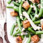 Everything you love about Caesar salad with a delicious twist. Green beans instead of lettuce! This Green Bean Caesar Salad is the perfect alternative to the traditional version and a great side dish to add to your table this holiday season!