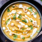 Thick, creamy, cozy, Curried Butternut Squash and Cauliflower Soup is as healthy as it is flavorful and delicious! Vegan, gluten-free, paleo and totally satisfying! #soup #paleo #vegan #glutenfree #butternutsquash #curry #cauliflower