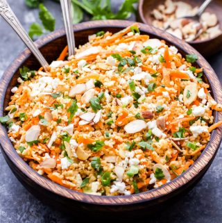 So many bright, fresh flavors in this Mediterranean Bulgur Salad with Carrots, Almond and Feta! It's so good you'll be going back for seconds and thirds! #salad #healthyrecipe #bulgur #carrots #mediterraneandiet