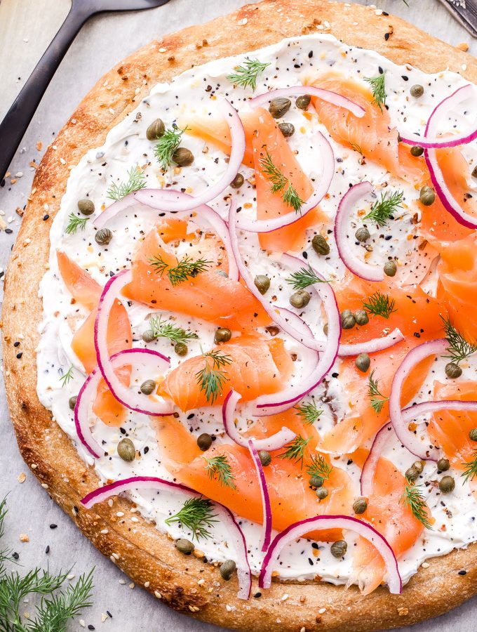 Everything Bagel and Lox Breakfast Pizza | If you love bagels and lox then you'll go crazy for this Everything Bagel and Lox Breakfast Pizza! A fun and tasty mashup on the classic that will have everyone grabbing a slice at your next brunch! #bagelsandlox #pizza #brunch #breakfast #lox