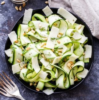 Zucchini Ribbon Salad with Lemon and Parmesan Cheese is a simple and easy to make salad that's loaded with fresh flavor! It's the perfect way to use this year's summer zucchini crop! #zucchini #salad #glutenfree #lemon #parmesancheese