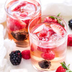 Berry Rosé Sangria is the perfect summer sipper! Sweet, but not too sweet and loaded with fresh berries, it will be a hit at all your summer parties! #sangria #rosé #strawberries #raspberries #blackberries #summercocktail #drink #wine