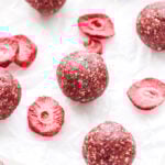 Strawberry Almond Energy Bites are easy to make and great for a pre or post workout snack. Gluten-free, paleo, vegan and full of strawberry flavor! #energybites #paleo #vegan #glutenfree #strawberry #almonds #healthysnack