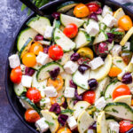 Mediterranean Zucchini, Tomato and Feta Salad is a fresh, light and easy to make summer salad. Tossed in a lemon herb vinaigrette, it's perfect for when your garden is overflowing with zucchini and tomatoes! #zucchini #tomatoes #salad #mediterraneanrecipe #glutenfree