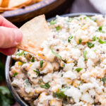 This Mexican Corn and Green Chile Dip will be a hit at your next party! Highly addictive and ready in 15 minutes or less! #dip #corn #greenchiles #Mexicanfood #appetizer #easyrecipe #glutenfree
