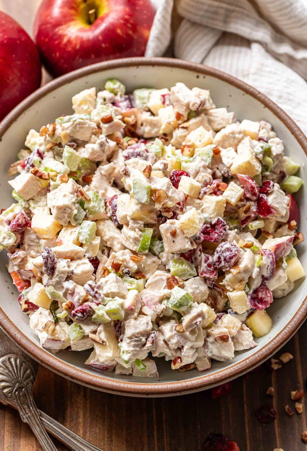 Harvest chicken salad in a white serving bowl.