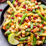 This Green Curry Chickpea and Vegetable Pasta is a healthy, quick and easy dinner that will be on the table in 15 minutes! A gluten-free, vegan, pasta dish loaded with veggies and plant based protein. You won't miss the meat at all! #pasta #easyrecipe #vegan #vegetarian #glutenfree #chickpeas #healthyrecipe #dinner