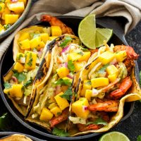 Grilled Shrimp Tacos with Avocado Slaw and Mango Salsa