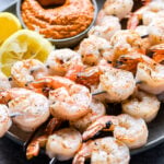 Grilled Shrimp with Romesco Sauce in small gray bowl