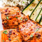 Closeup of Chipotle Maple Grilled Salmon with grilled zucchini and rice
