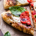 A slice of the Grilled Caprese Pizza