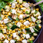 Grilled Zucchini Corn Salad with Lemon Basil Vinaigrette in black bowl