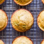 overhead photo of Lemon Zucchini Muffins on wire cooling rack.