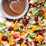 Sweet Potato, Wild Rice and Arugula Salad with dried cranberries, pecans and a bowl of balsamic maple vinaigrette.