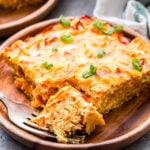 Sweet Potato, Bacon and Egg Breakfast Casserole with piece cut off and on a fork.
