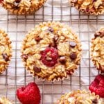 Raspberry Chocolate Chip Baked Oatmeal Cups on a wire cooling rack.