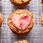 Apple Cinnamon Baked Oatmeal Cup on a wire cooling rack.