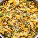 brown butter brussels sprouts pasta in a stainless steel skillet