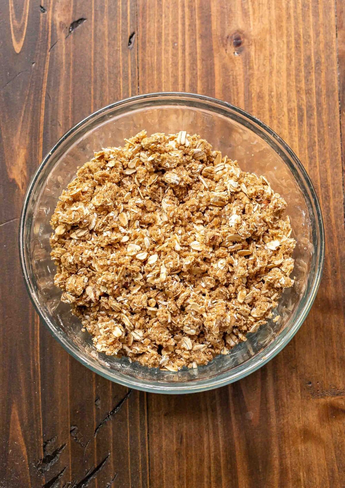 Topping for pumpkin crisp in a glass bowl.