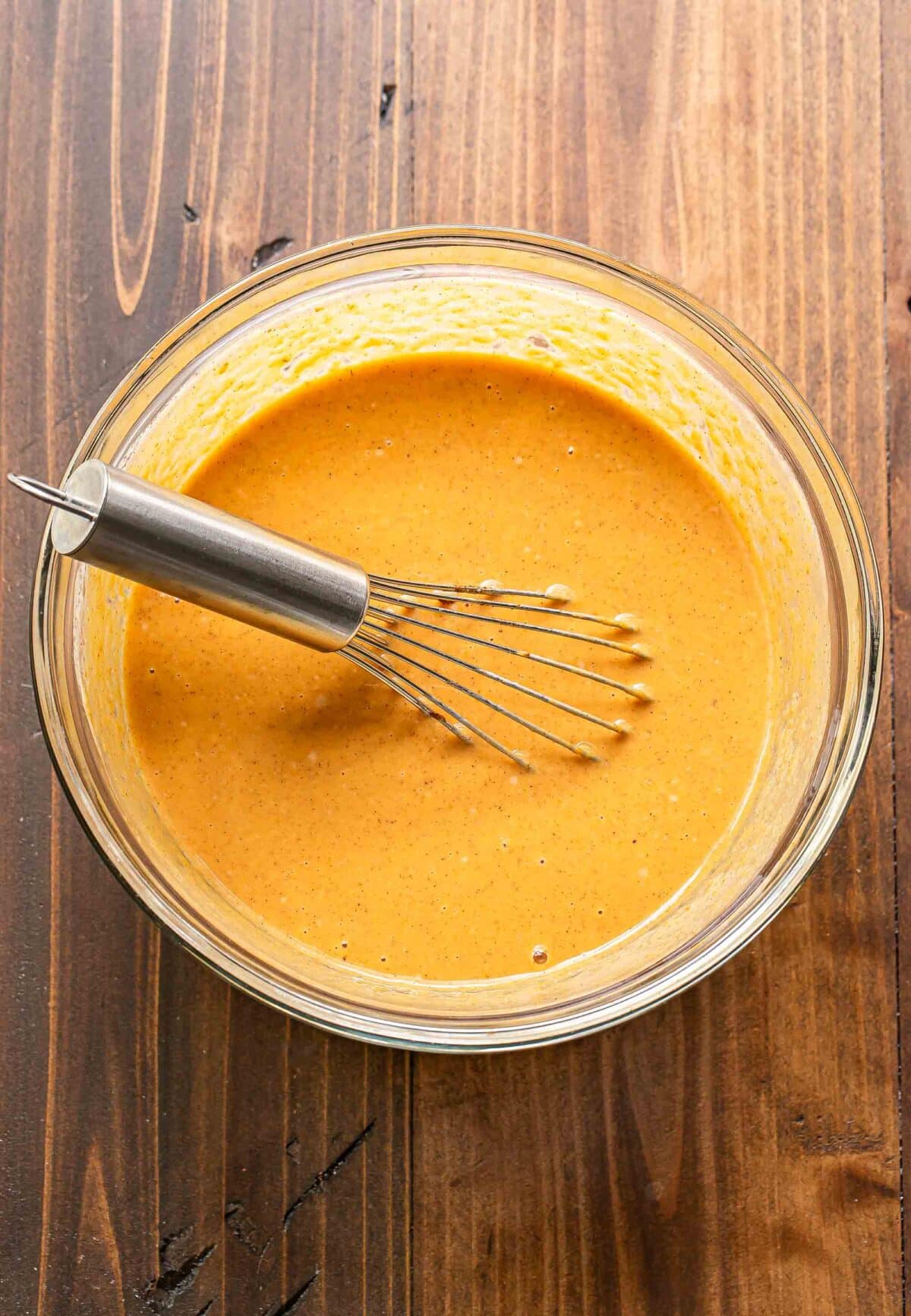 Pumpkin crisp filling in a glass bowl.