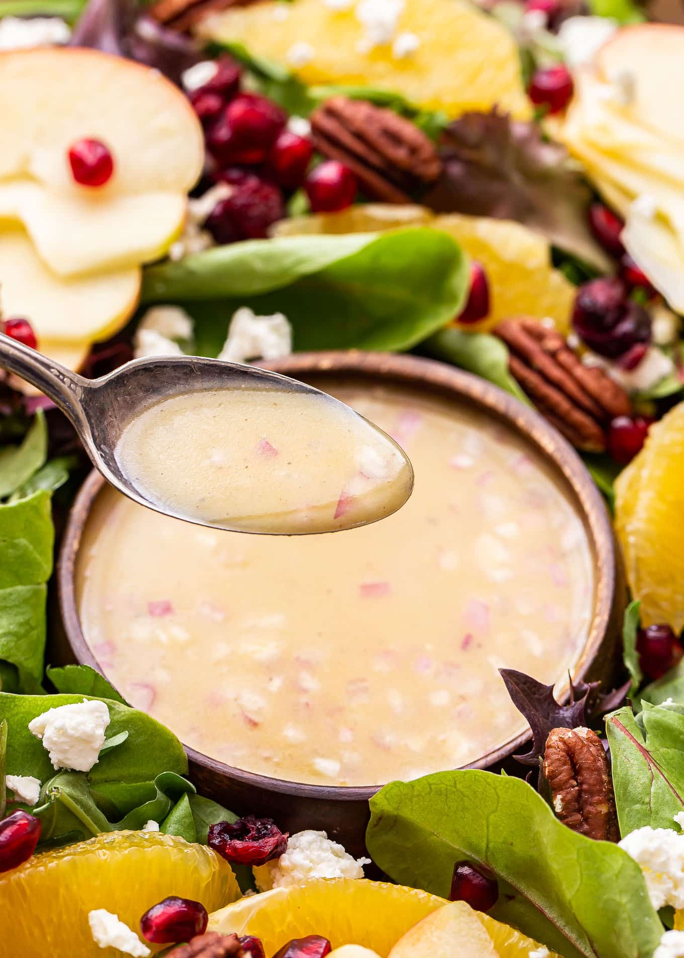 spoon holding up some of the vinaigrette