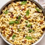 Sun Dried Tomato Feta Pasta in a stainless steel skillet.