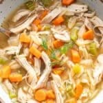 Lemon Chicken Orzo Soup in a white bowl.