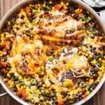 Santa Fe Chicken with black beans and corn in a stainless steel skillet.