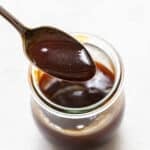 Spoon holding up teriyaki sauce.