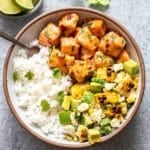 Honey Chipotle Salmon Rice Bowl with corn avocado salsa.