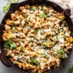 Mexican chicken and potatoes topped with melted cheese and cilantro.