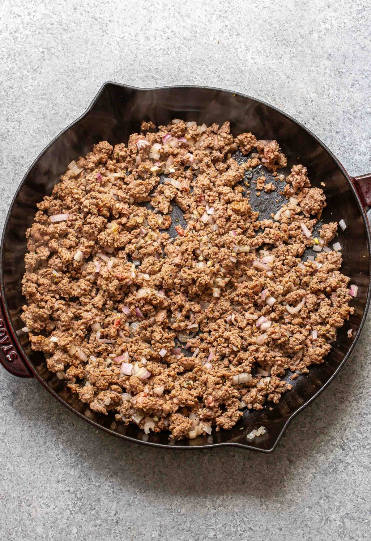 cooked ground beef in a skillet.
