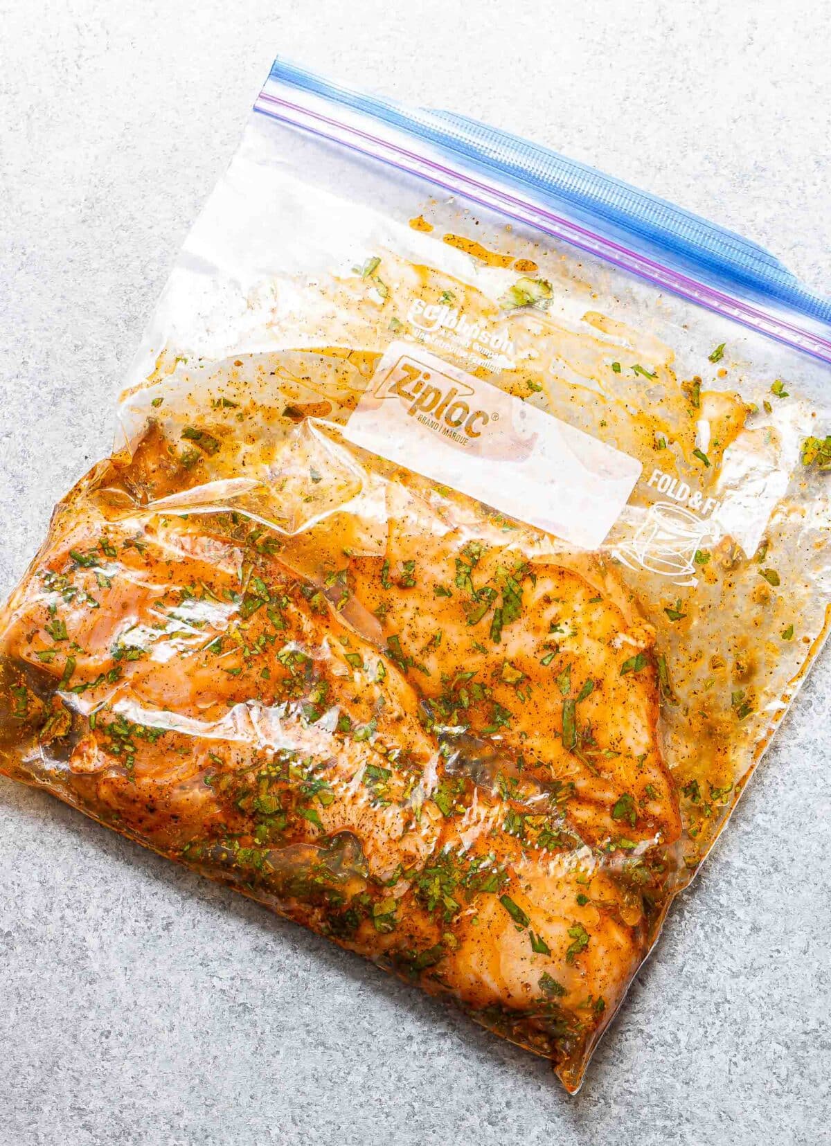 Chicken breasts in a freezer bag with southwest marinade.